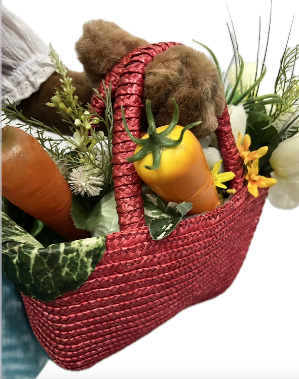 Rabbit with vegetables in a shopping basket
