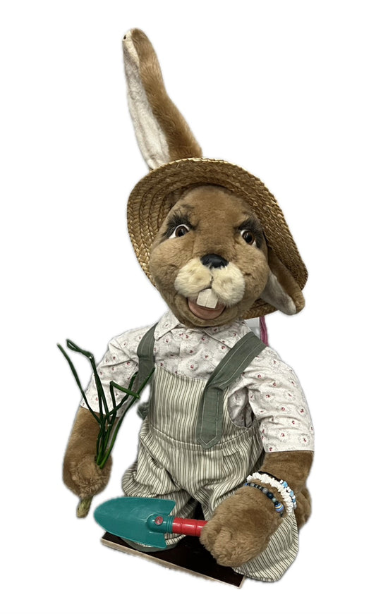 Rabbit with planting shovel, kneeling 