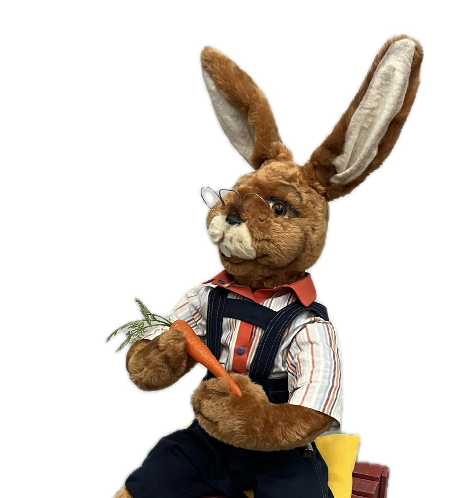 Rabbit sitting with carrot