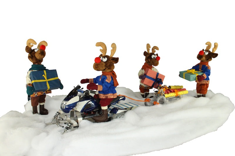 Rudi's reindeer troop delivers gifts with snowmobiles 