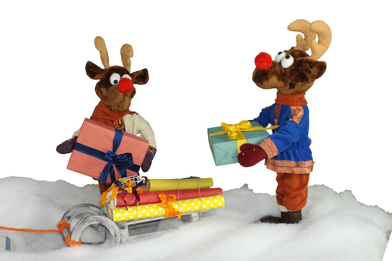 Rudi's reindeer troop delivers gifts with snowmobiles 