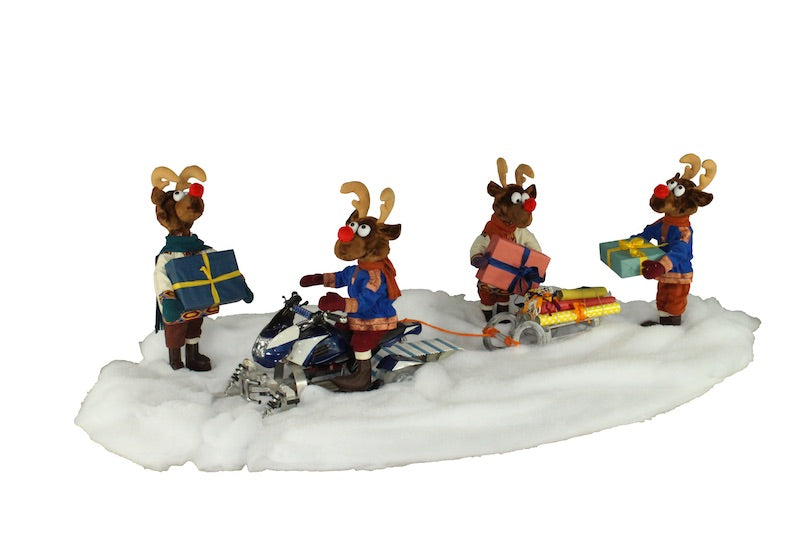 Rudi's reindeer troop delivers gifts with snowmobiles 